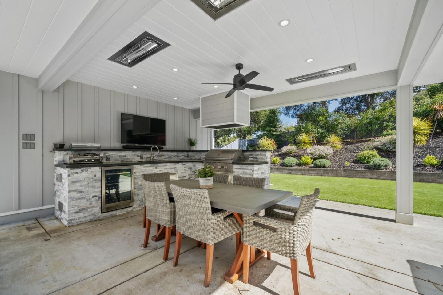575 Darrell Road Hillsborough, CA 94010 - Photo 62 of 75 a view of a dining room with furniture window and outside view