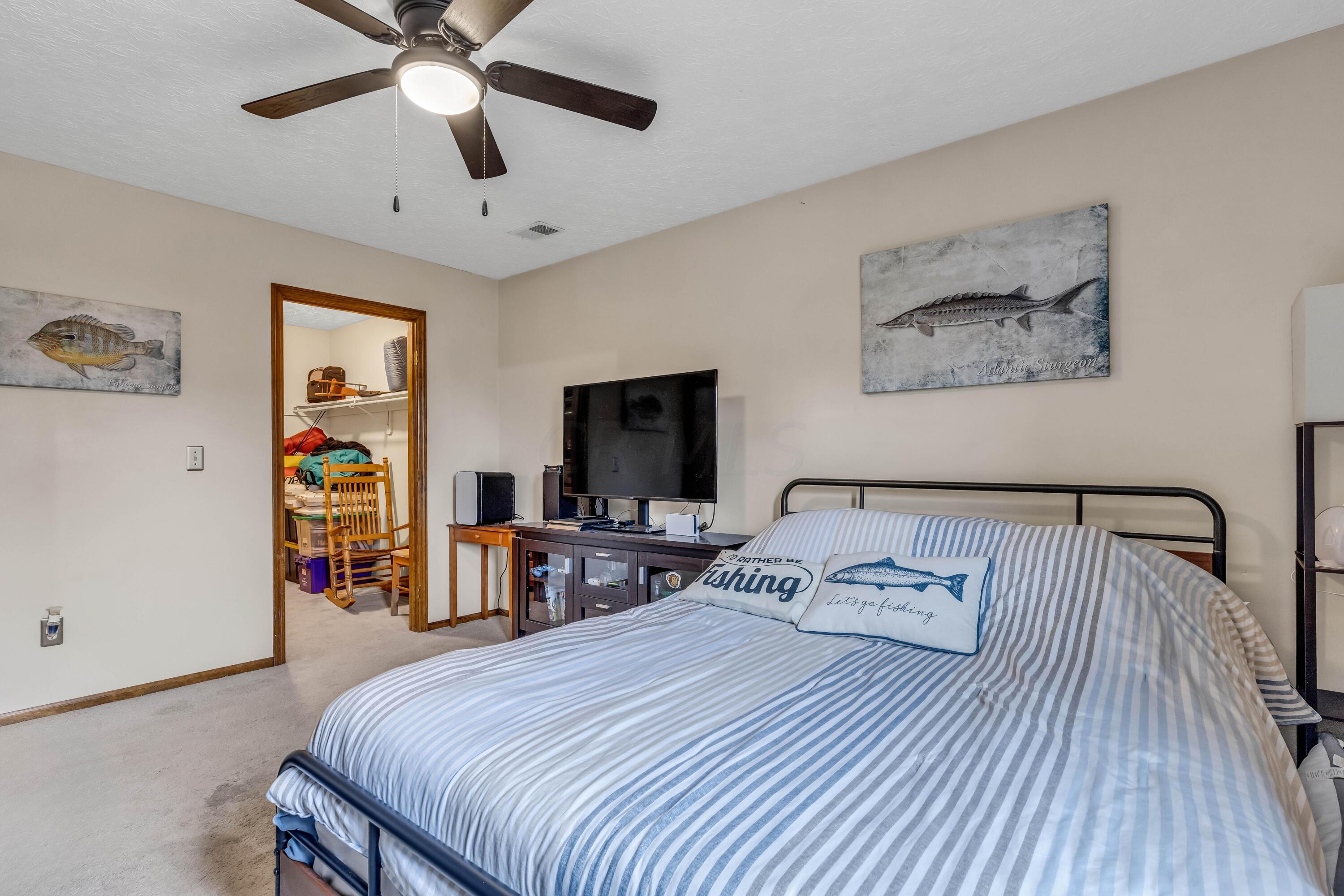 435 Emory Street Gahanna, OH 43230 - Photo 37 of 54 • Light sand carpet
• Tan painted walls
• Lighted ceiling fan
• Drapes remain