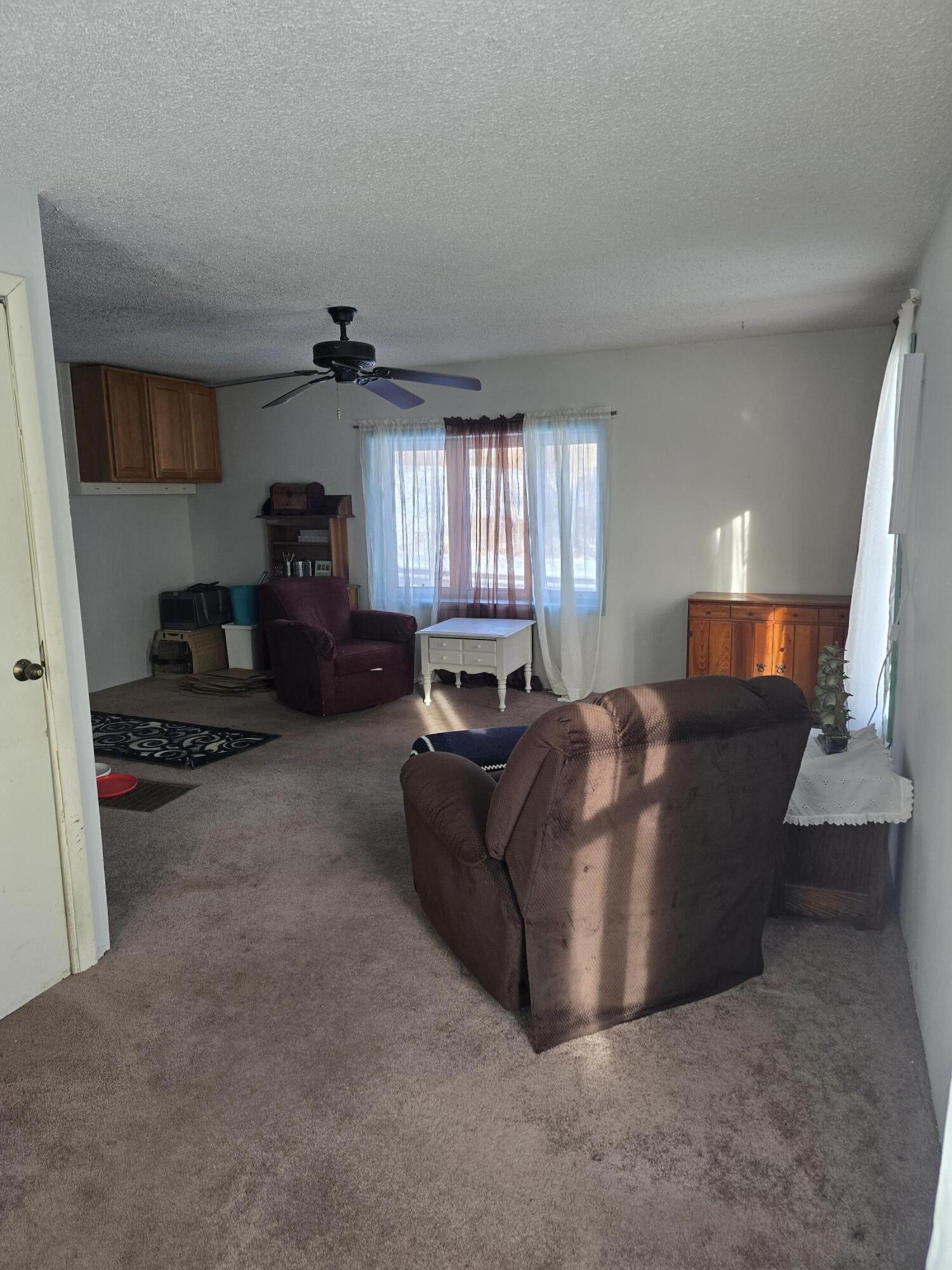 3820 11 Mile Road Northeast Rockford, MI 49341 - Photo 14 of 27 living room 2