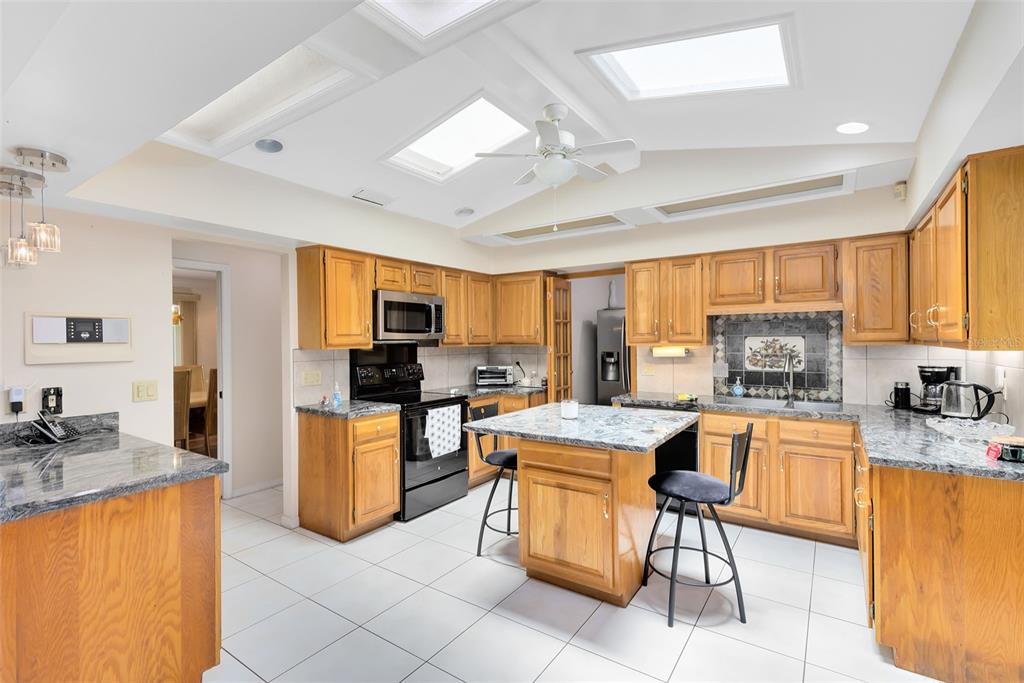 111 Variety Tree Circle Altamonte Springs, FL 32714 - Photo 8 of 35 An inviting eat-in kitchen seamlessly blends functionality and style.