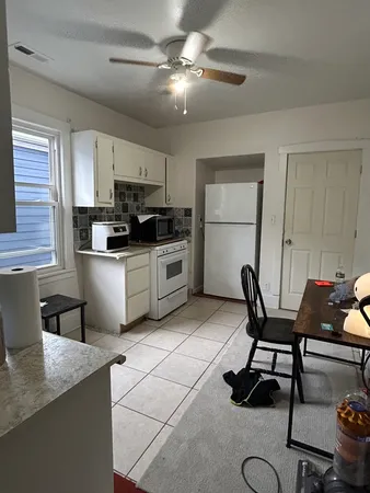 a view of a room with storage and utility room