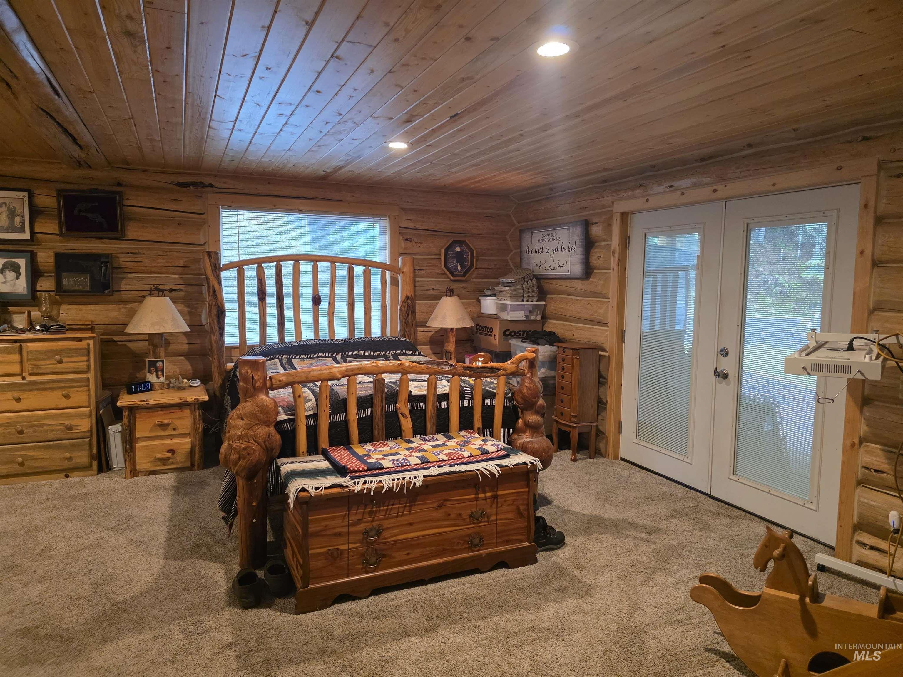 112 Three Forks Road Kamiah, ID 83536 - Photo 16 of 45 Interior space featuring log walls, wood-finish planked ceiling, and recessed lighting
