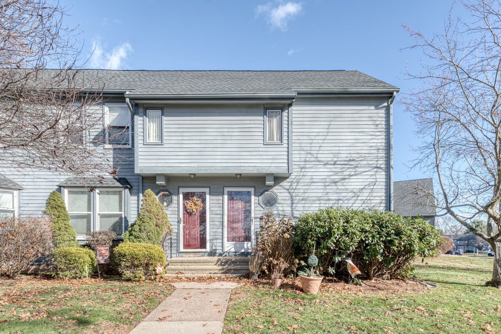1 Abbott Road, Unit 101 Ellington, CT 06029 - Photo 1 of 1 a front view of a house with garden