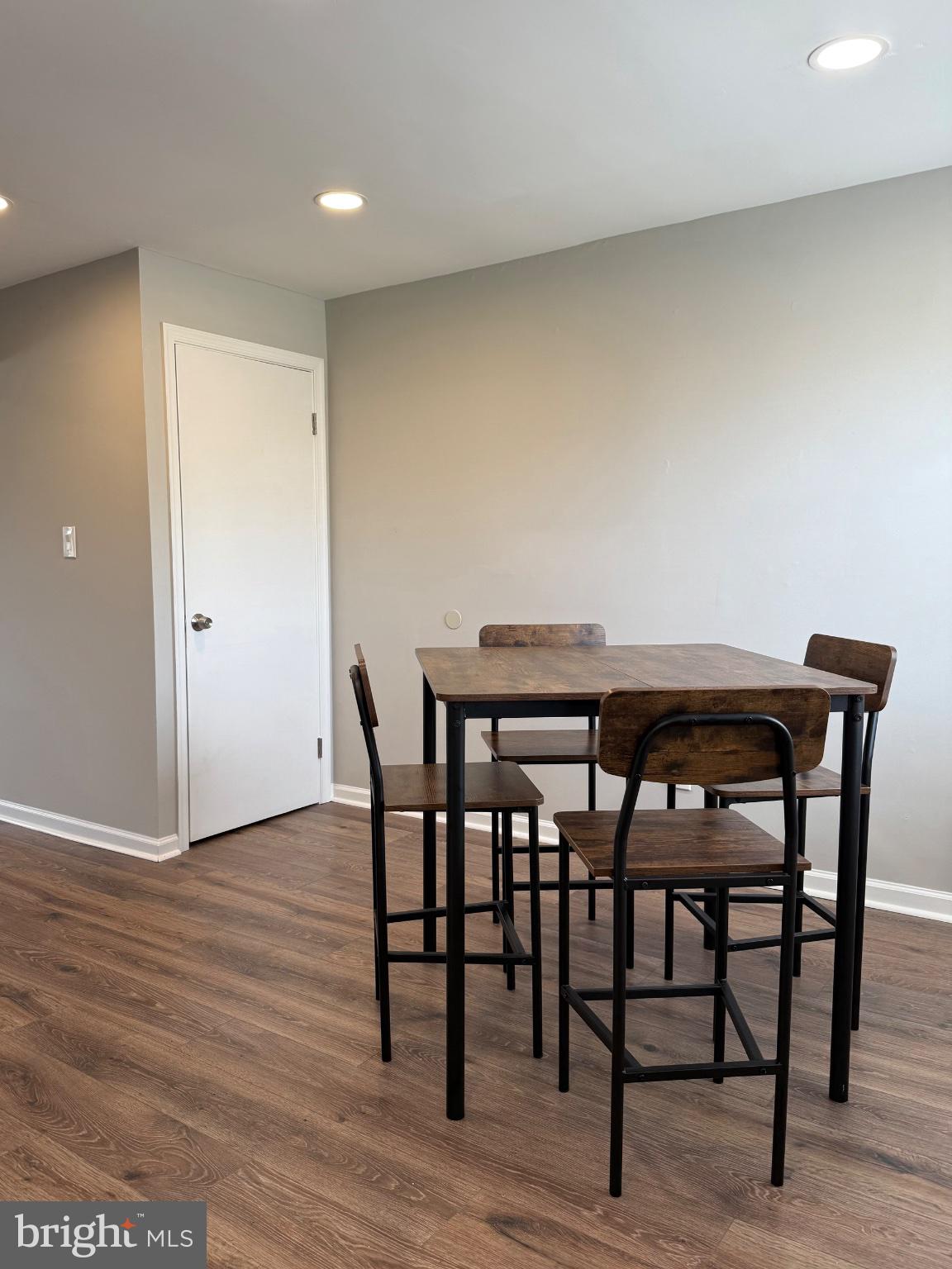 2908 Mallview Road Baltimore, MD 21230 - Photo 8 of 22 a view of a dining room with furniture and wooden floor