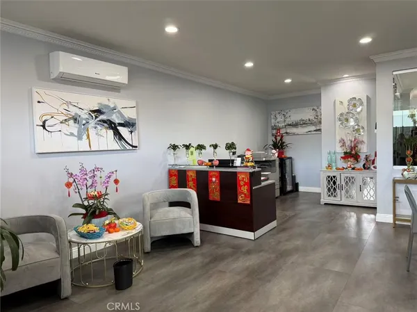 a room with furniture and soccer table