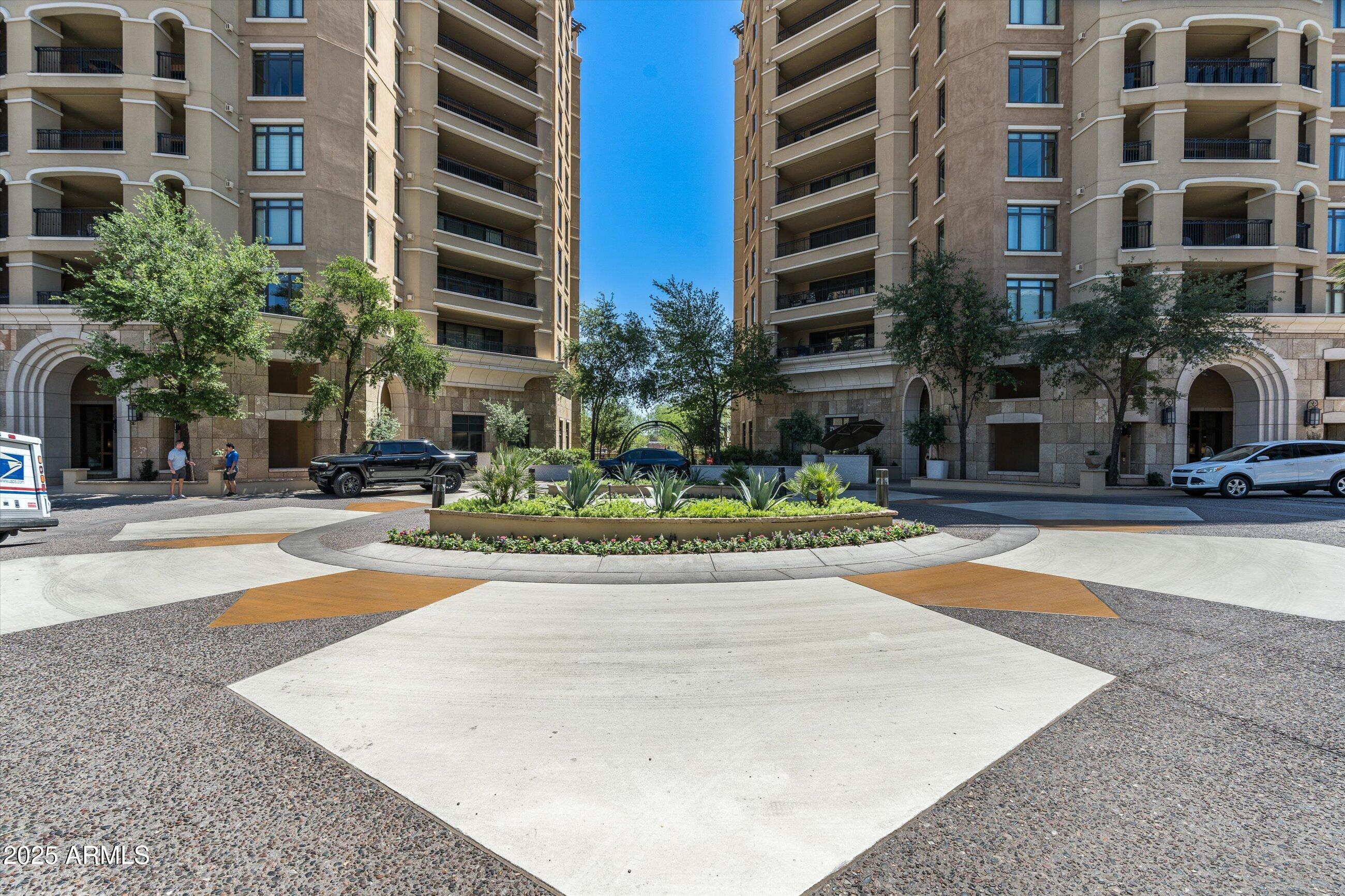 7175 East Camelback Road, Unit 510 Scottsdale, AZ 85251 - Photo 2 of 34 a view of building with yard