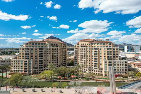 a view of a city with tall buildings