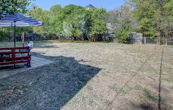 a stairs and yard with wooden floor