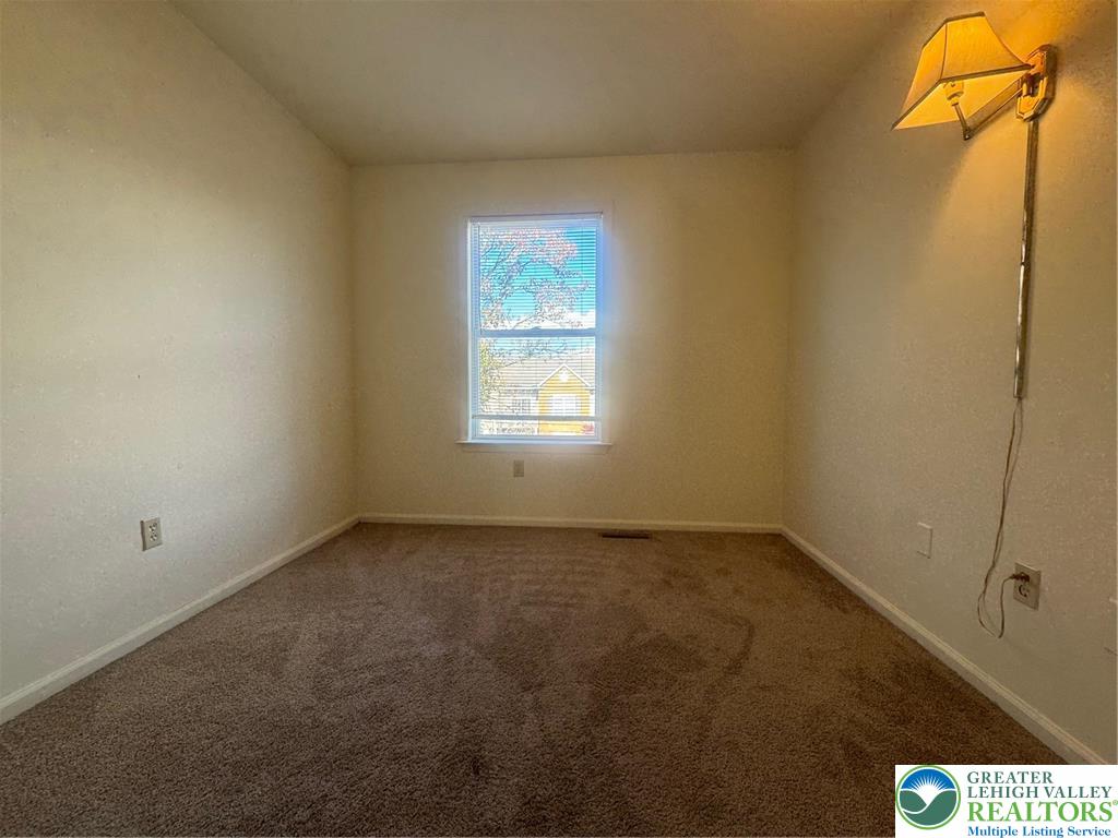 318 Mickley Road Whitehall, PA 18052 - Photo 17 of 25 a view of an empty room with a window