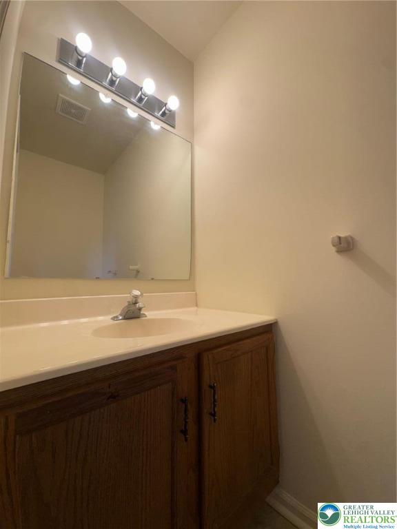 318 Mickley Road Whitehall, PA 18052 - Photo 19 of 25 a bathroom with a sink and a mirror