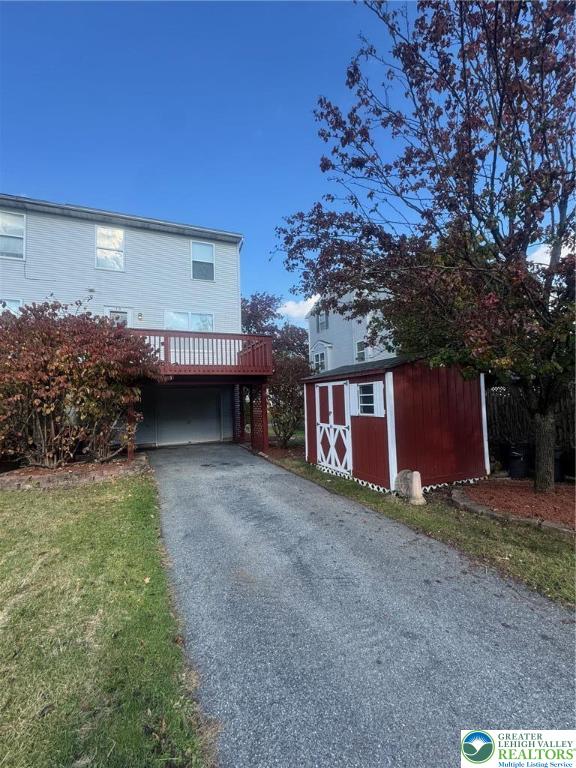 318 Mickley Road Whitehall, PA 18052 - Photo 24 of 25 a view of a house with a yard and tree