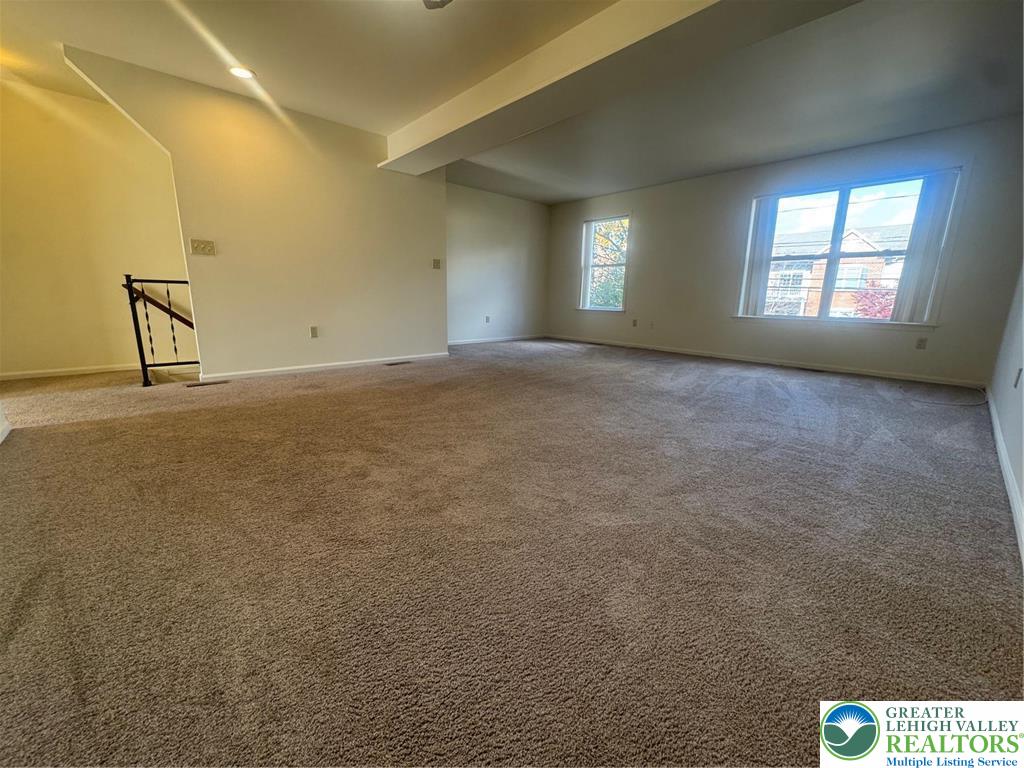 318 Mickley Road Whitehall, PA 18052 - Photo 6 of 25 a view of an empty room with a window