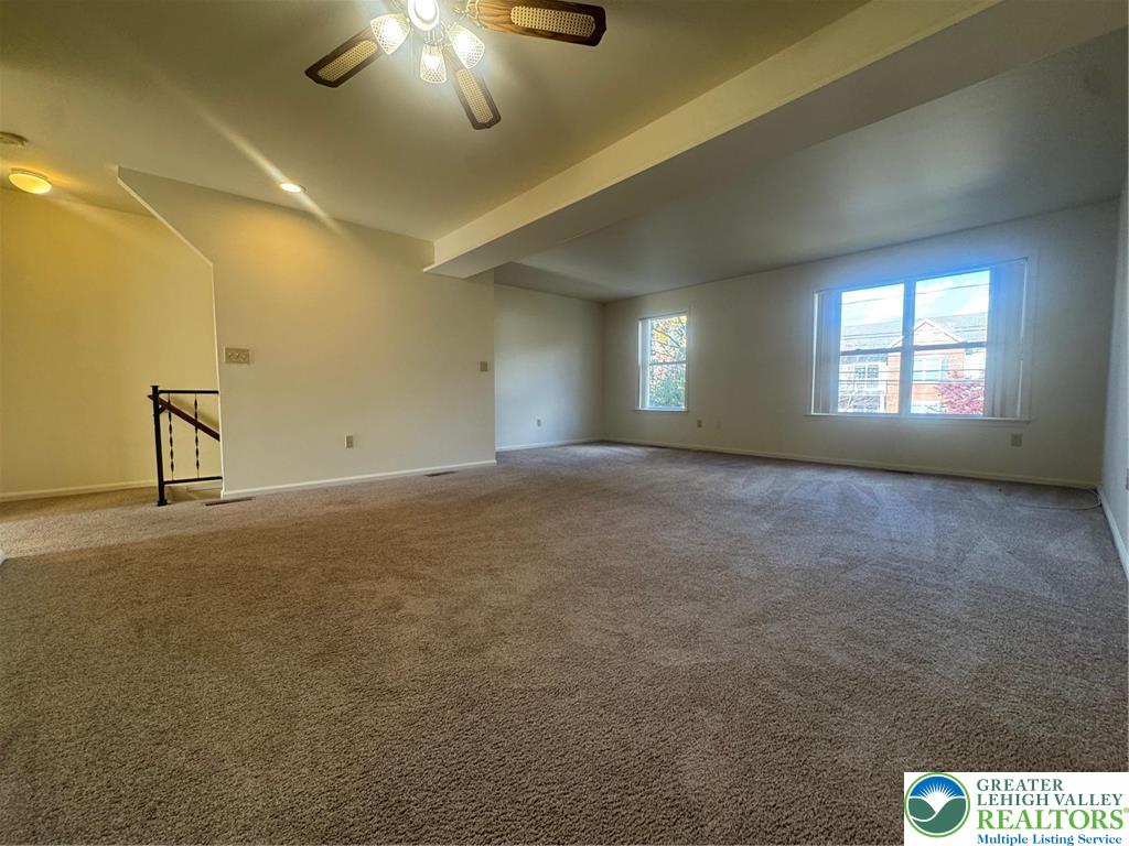 318 Mickley Road Whitehall, PA 18052 - Photo 7 of 25 a view of an empty room with a window