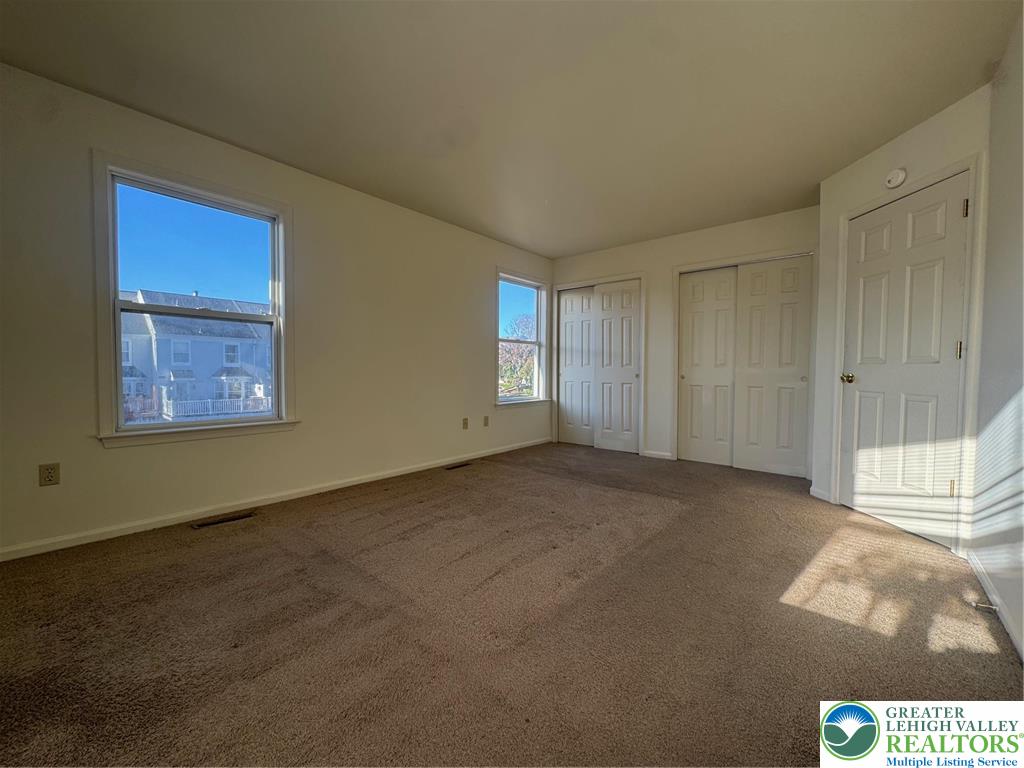318 Mickley Road Whitehall, PA 18052 - Photo 9 of 25 a view of an empty room and a window