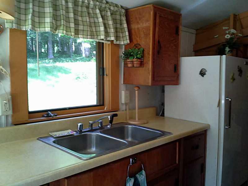 31 Hatchery Road Rangeley, ME 04964 - Photo 26 of 35 Kitchen. Good dish washing view!!!