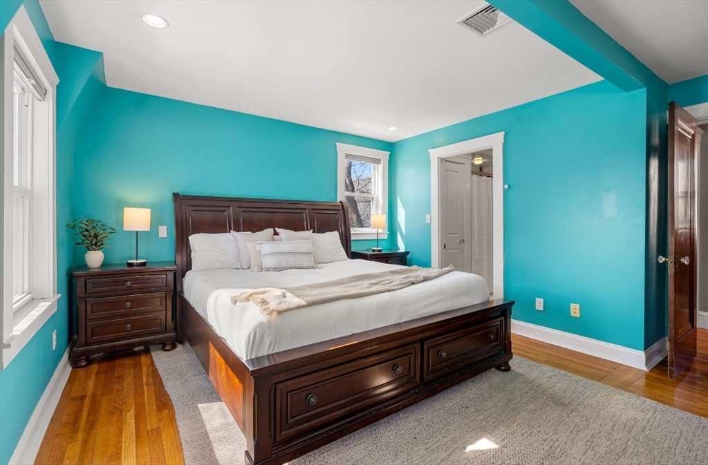 15 Lexington Terrace, Unit 1 Waltham, MA 02452 - Photo 4 of 13 a bed sitting in a bedroom next to a window