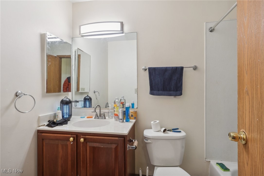 1042 Ansel Road Cleveland, OH 44103 - Photo 29 of 36 Full bathroom with vanity, toilet, and bathtub / shower combination