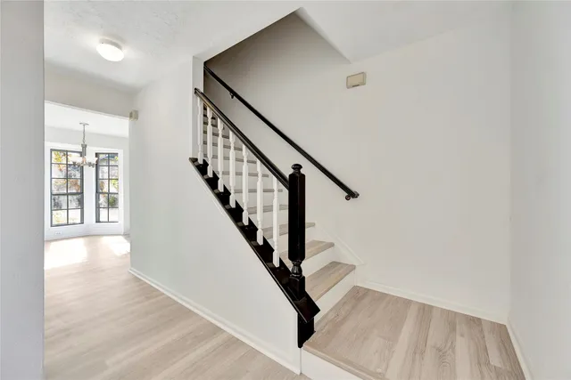 a view of entryway with wooden floor