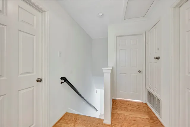 a view of a hallway with an entryway