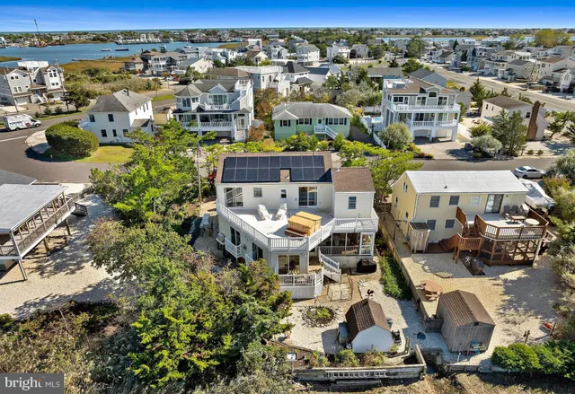 an aerial view of a house with yard and outdoor space