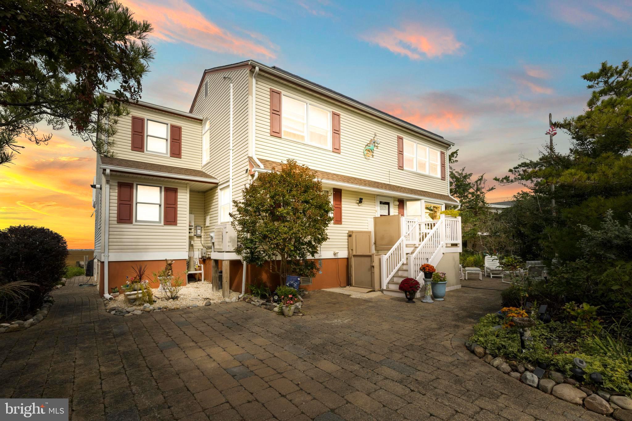6 Collier Road Long Beach Township, NJ 08006 - Photo 7 of 24 a view of a house with a yard
