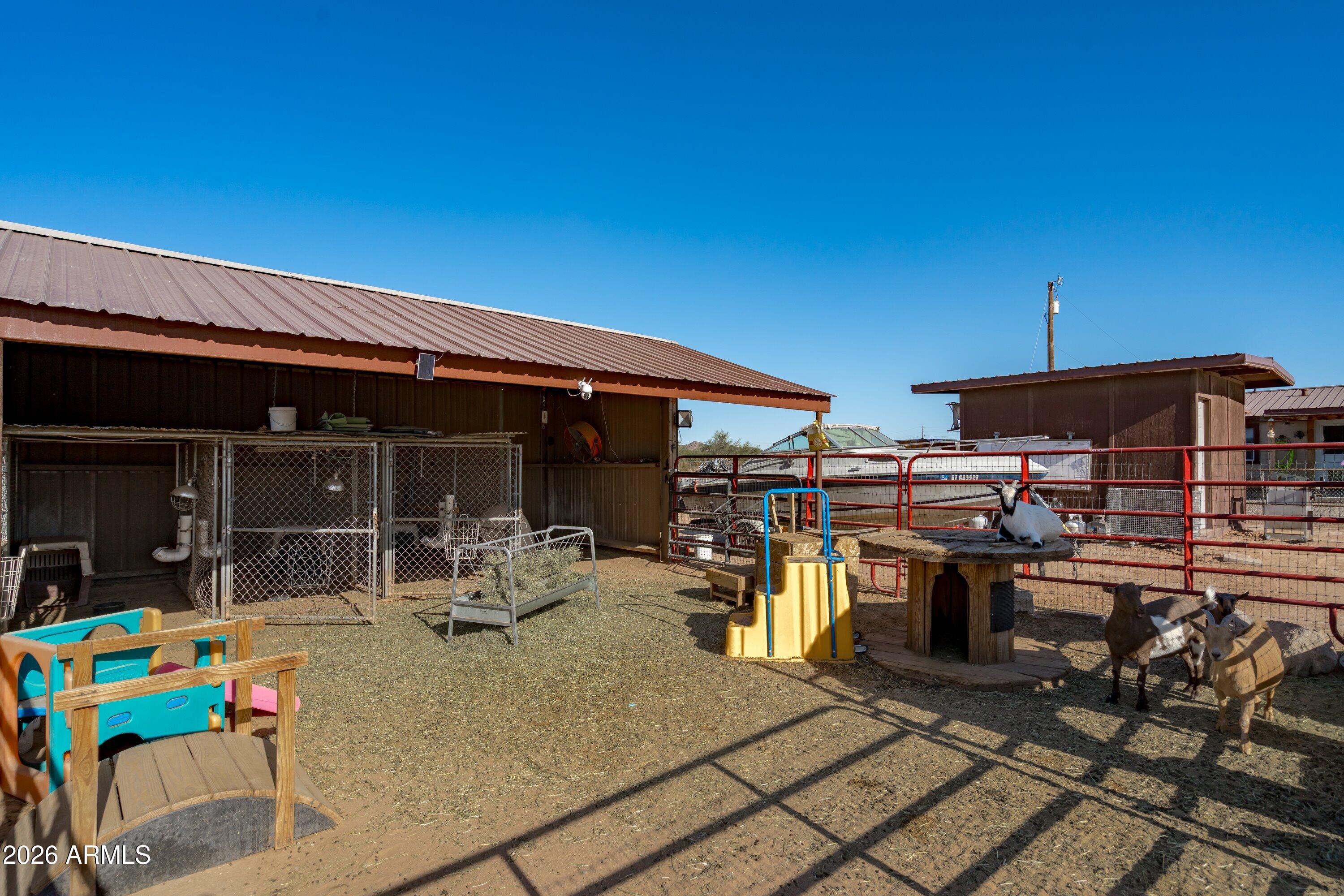 20340 West Narramore Road Buckeye, AZ 85326 - Photo 28 of 44 35-Goat Stalls