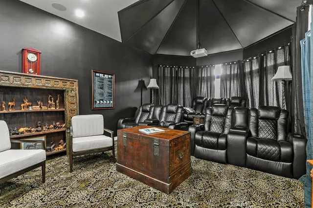 a bathroom with a sink mirror vanity and toilet