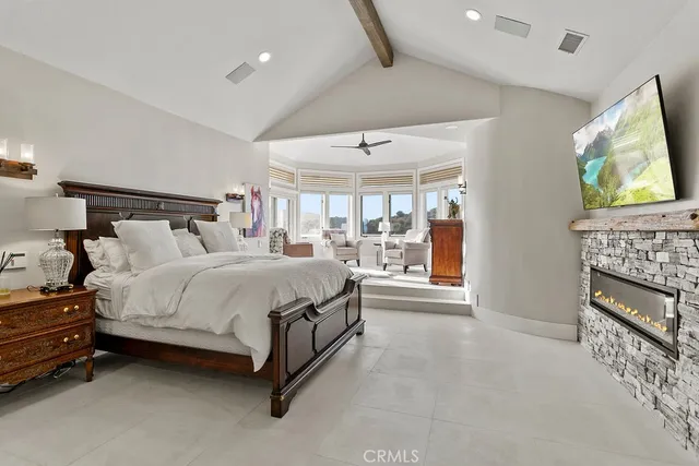 a spacious bathroom with a double vanity sink a two mirror and a bathtub