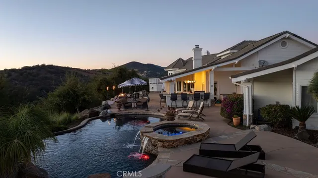 a view of a swimming pool with an ocean view