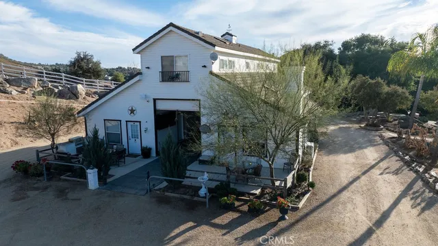 a view of a street with a building in the background