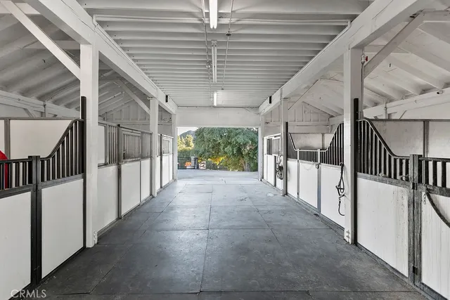 a aerial view of a house with a street