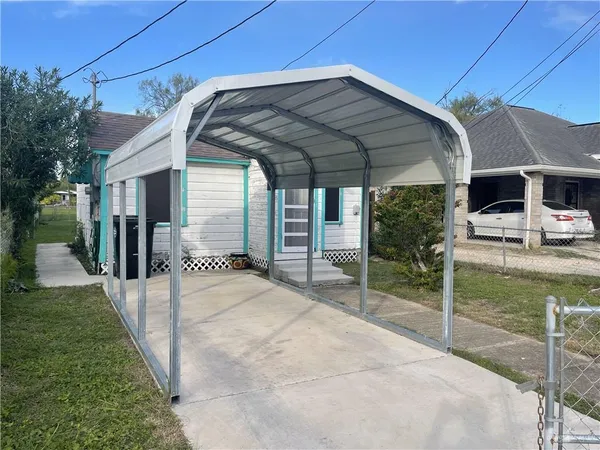 a house view with a outdoor space