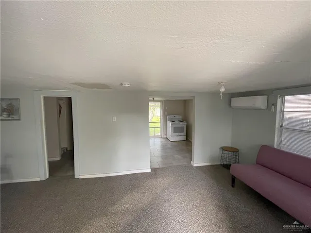 a view of a livingroom with furniture and a couch