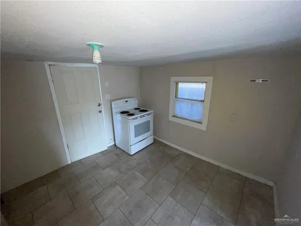 a view of kitchen and window