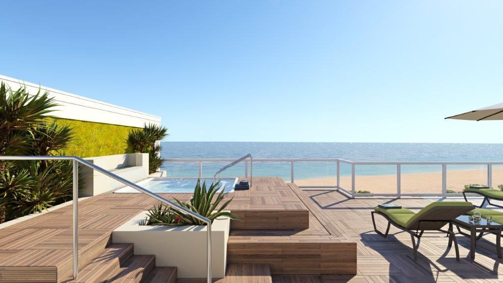 936 Surfsedge Way Vero Beach, FL 32963 - Photo 8 of 11 a view of a patio with table and chairs under an umbrella with wooden floor
