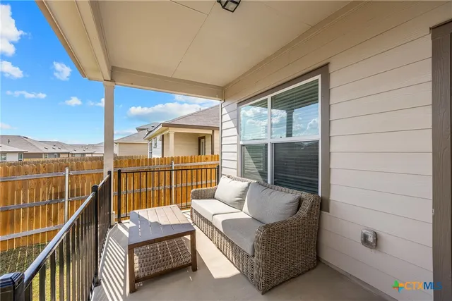 a balcony view with a couch