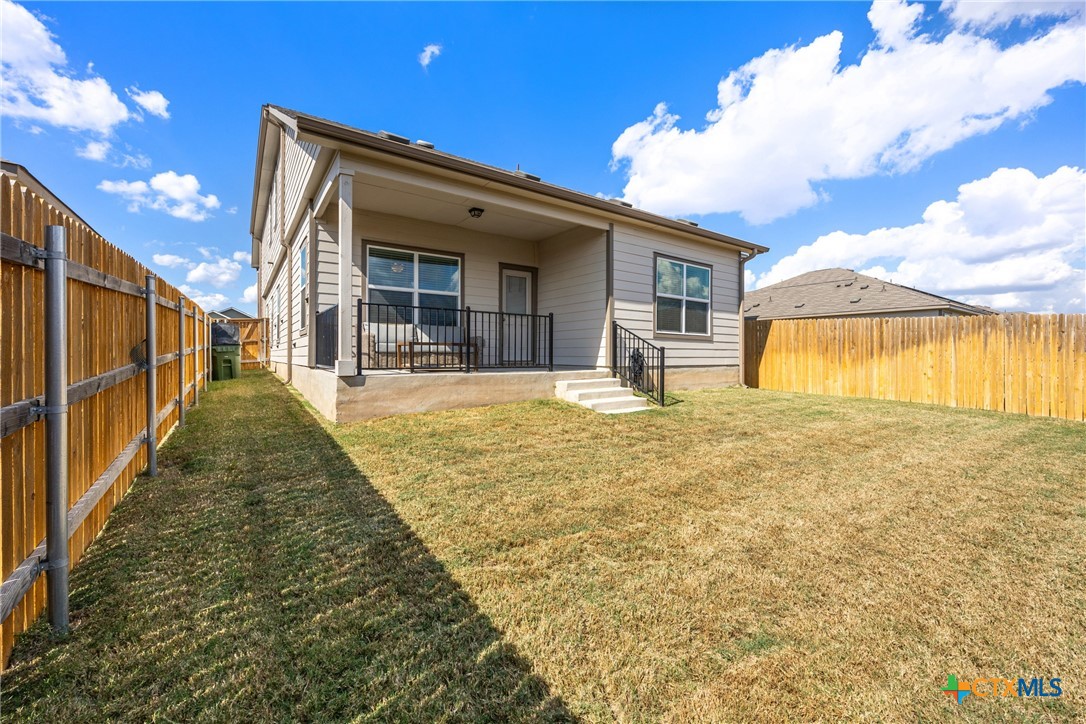 141 Rowdy Yates Way Jarrell, TX 76537 - Photo 25 of 32 a view of a house with a swimming pool