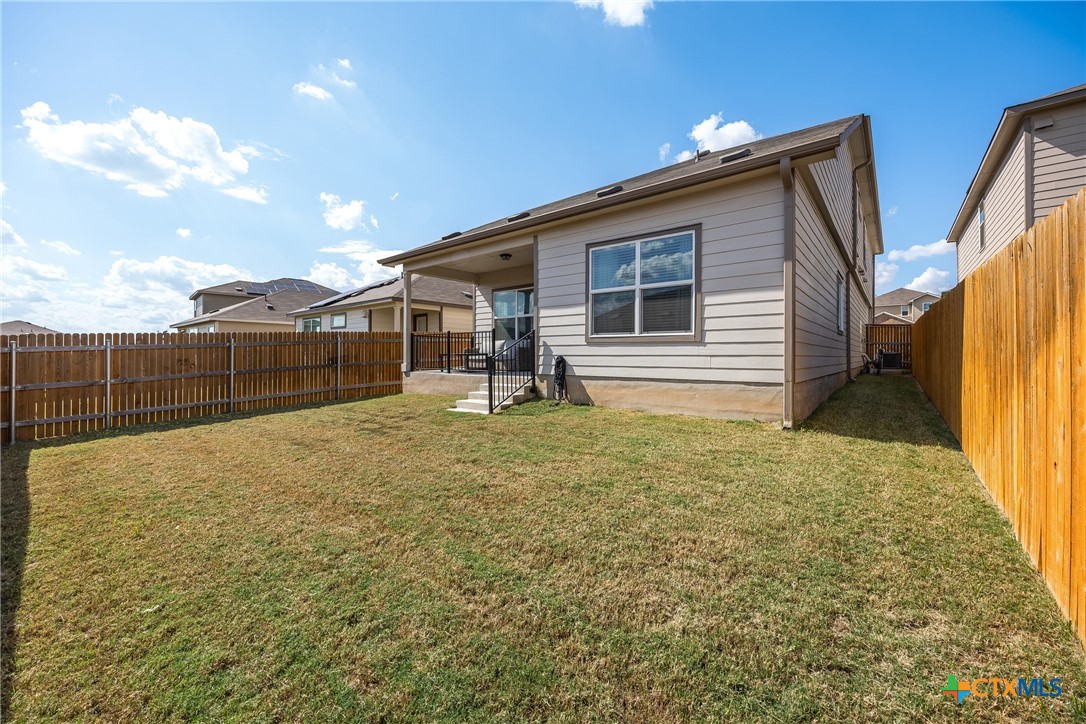 141 Rowdy Yates Way Jarrell, TX 76537 - Photo 26 of 32 a view of outdoor space and yard