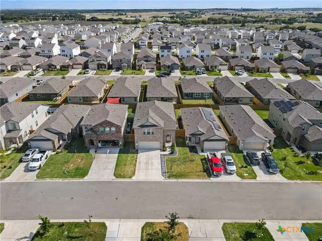 an aerial view of multiple house