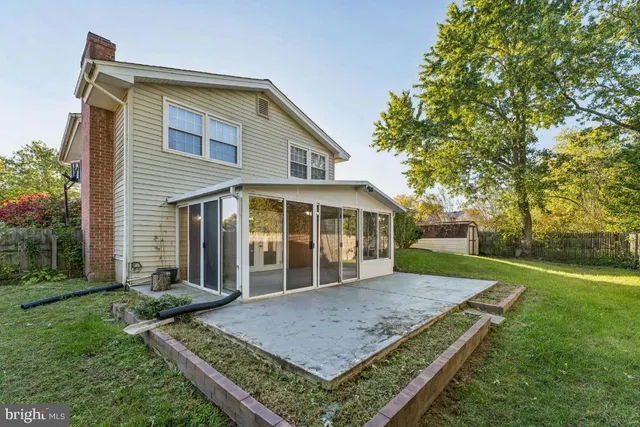 a front view of a house with a yard and porch