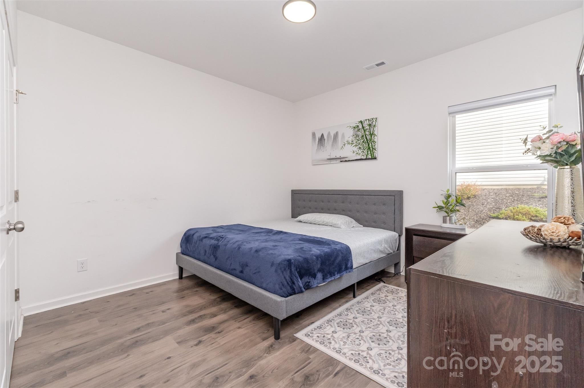 3127 Pinehills Wy. Mount Holly, NC 28120 - Photo 13 of 35 a bedroom with a bed and window