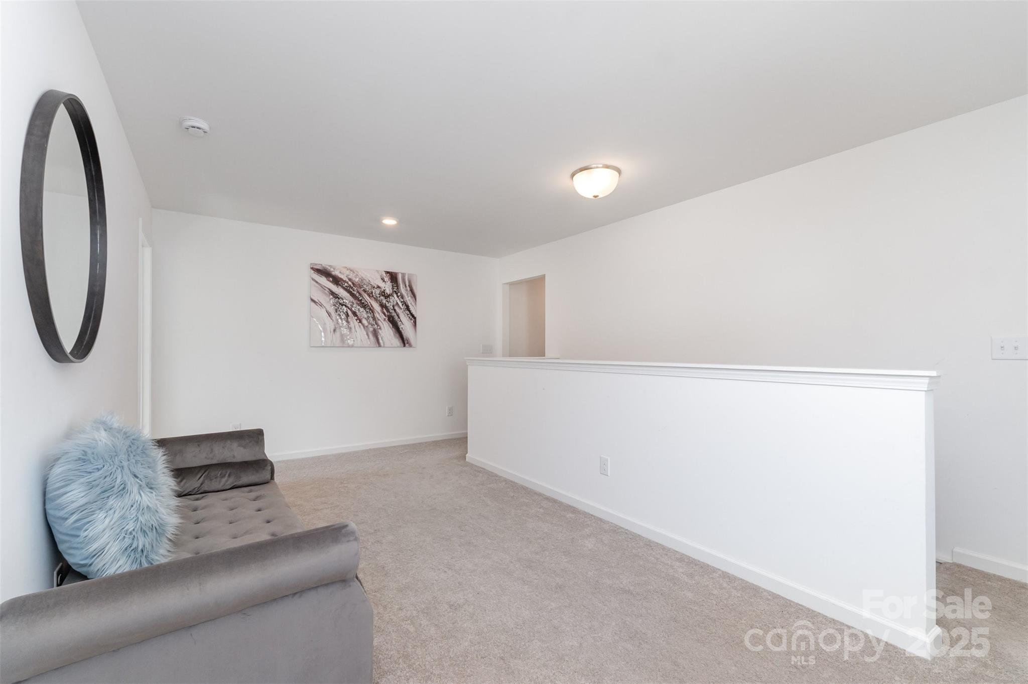 3127 Pinehills Wy. Mount Holly, NC 28120 - Photo 18 of 35 a living room with furniture and a window