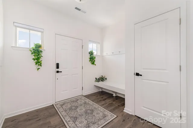 a view of kitchen with wooden floor