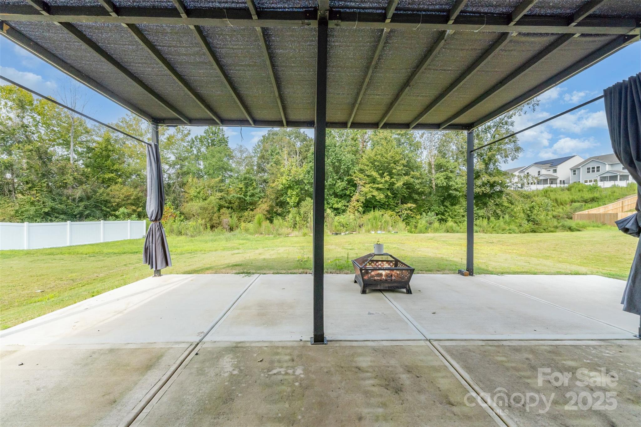 3127 Pinehills Wy. Mount Holly, NC 28120 - Photo 30 of 35 a view of a porch with furniture and garden