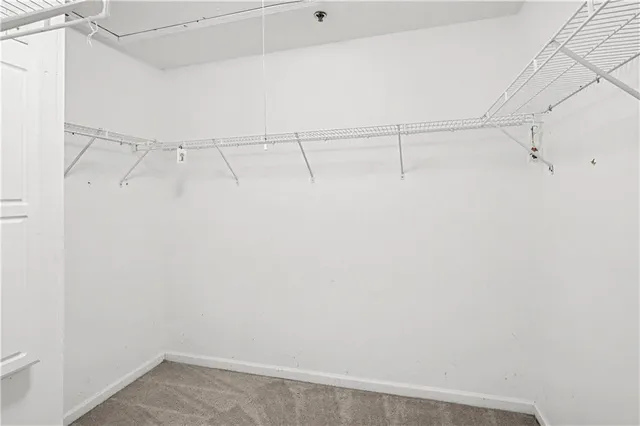 a view of a balcony with chairs