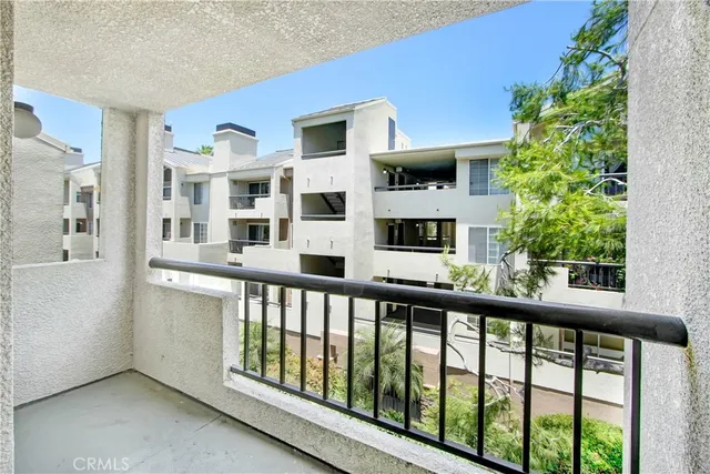 a view of a building from a balcony