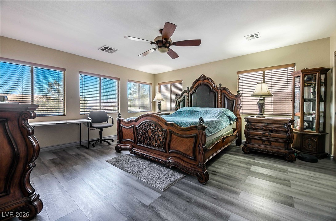 418 Finch Ridge Avenue North Las Vegas, NV 89032 - Photo 21 of 43 Bedroom featuring wood finished floors and ceiling fan