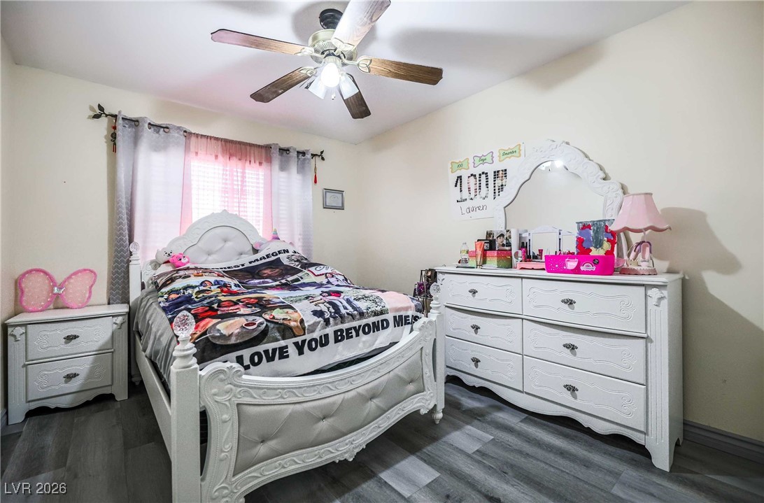 418 Finch Ridge Avenue North Las Vegas, NV 89032 - Photo 29 of 43 Bedroom with dark wood finished floors and a ceiling fan