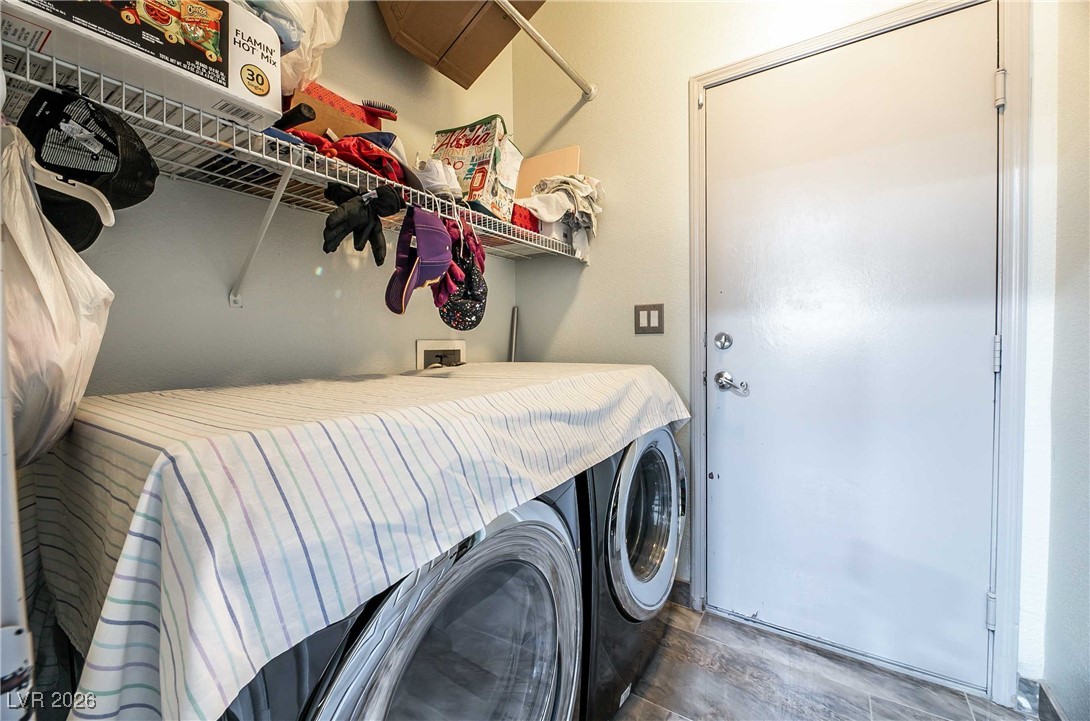 418 Finch Ridge Avenue North Las Vegas, NV 89032 - Photo 33 of 38 Washroom featuring hookup for a washing machine and dark wood-style flooring