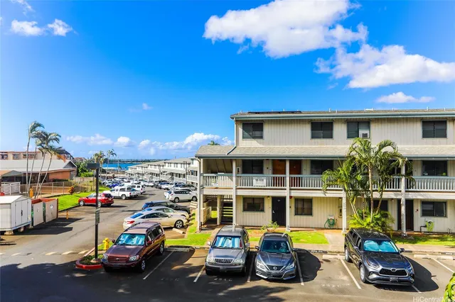 a view of a street with cars